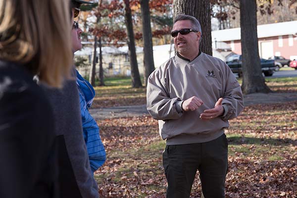 Instructor Ted Szczawinski talks with a student during the Hazardous Tree ID class