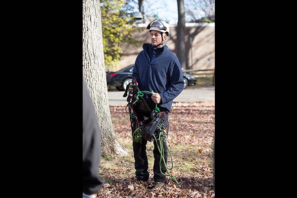 Instructor Mark Chisholm prepares his harness during the outdoor demonstration