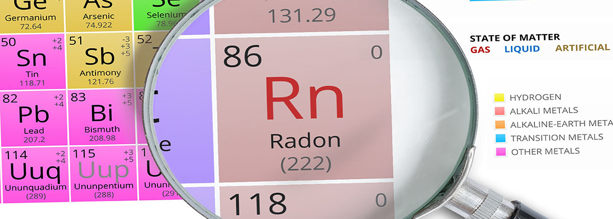 Radon Element on Periodic table magnified with magnifying glass