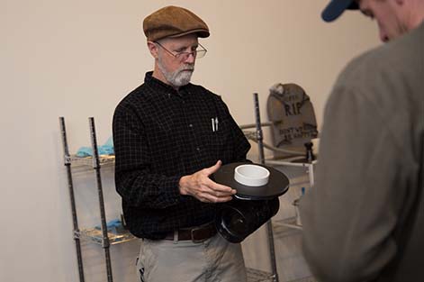 Instructor Bill Brodhead demonstrates components of radon mitigation systems
